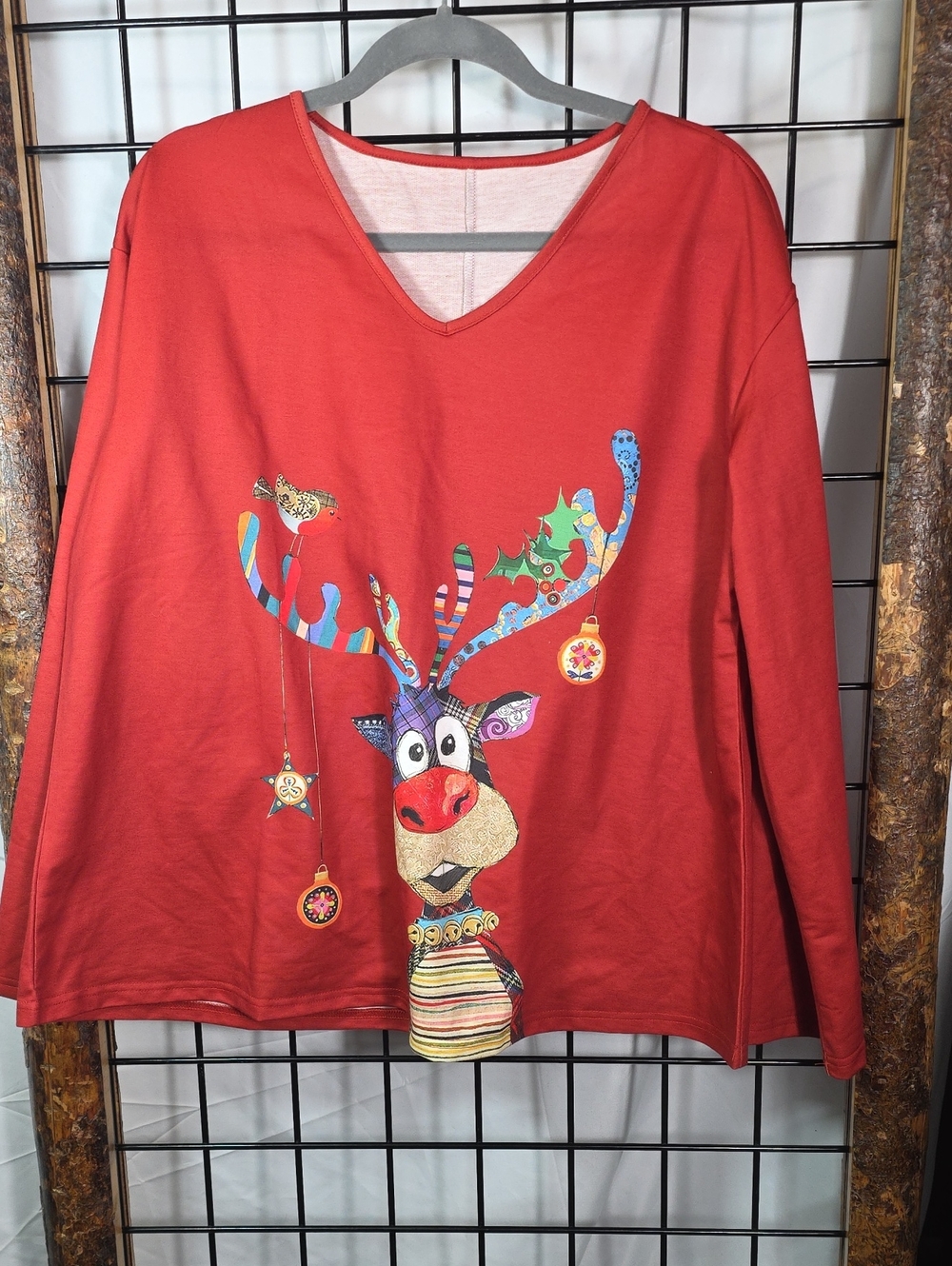 Women's Red Long-Sleeve V-Neck Sweatshirt with Festive Reindeer Graphic